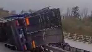 Truck overturns on motorway as Storm Barra intensifies