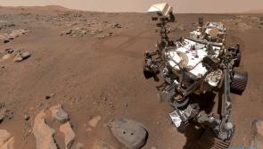 Mars rover collecting samples to determine if there was life on the red planet