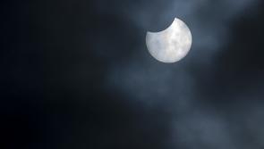 IN PICTURES: Partial solar eclipse snapped in Irish skies
