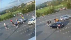 Car slams into group in Galway carpark amid mass brawl as terrifying video emerges 
