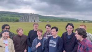 Popular Irish a cappella group sing My Lovely Horse outside Father Ted's house