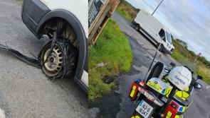 Garda&iacute; stop van driver with blown out tyre, no tax, and no seatbelt on busy Irish road