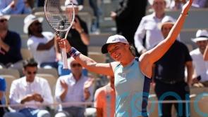 Iga Swiatek eases into French Open final after getting fired up by Led Zeppelin