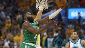 Boston Celtics ride late surge to 120-108 victory over the Golden State Warriors