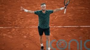Casper Ruud overcomes protest distraction to conquer Marin Cilic at French Open