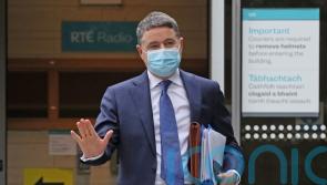 Government to focus on booster uptake as it prepares mask legislation