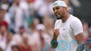 Nick Kyrgios through to Wimbledon quarter-finals despite shoulder problem
