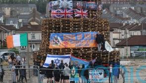 DUP leader and SF MLA condemn placing of flags and images on nationalist bonfire