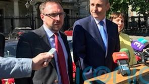 Robert Troy defends decision to call for more funding for scheme he earns from