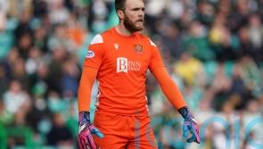 Hearts sign Scotland goalkeeper Zander Clark on three-year deal