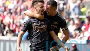 Arsenal breeze past Brentford to return to Premier League summit