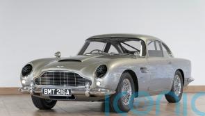 James Bond Aston Martin stunt car sells for huge sum at charity auction