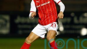 Swindon captain Angus MacDonald out for weeks with dislocated collar bone