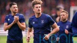 Reece Burke may miss out when Luton face Huddersfield