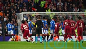 Liverpool back in form while Bayern Munich set Champions League record