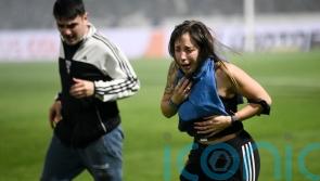 One dead after clashes between fans and police at football match in Argentina