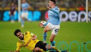 Man City secure top spot in group despite being held by Borussia Dortmund
