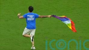 Qatar pitch invader who carried rainbow flag says he will not face legal action