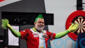 Peter Wright launches World Championship defence in style with comfortable win