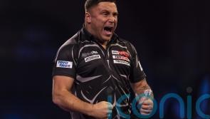 Gerwyn Price begins quest for second world title with win against Luke Woodhouse