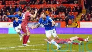 Scott Arfield rocks Aberdeen with stoppage-time double as Rangers snatch win