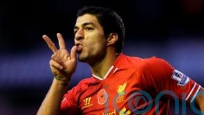 On this day in 2012 &ndash; Liverpool defiant despite accepting Luis Suarez racism ban