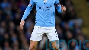 John Stones fires title warning to Arsenal after Man City cut gap to five points