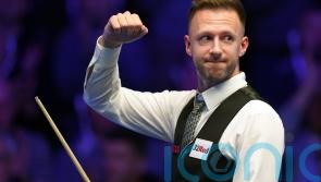 Judd Trump rallies from behind to beat Barry Hawkins into Masters semi-finals