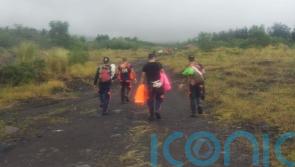 Wreckage of small plane found near crater of volcano amid search for four people