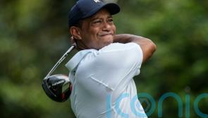 Tiger Woods labours in Masters first round as Jon Rahm stages stunning fightback