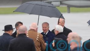 Biden braves wet and windy conditions on arrival at Dublin Airport