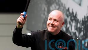 John Higgins dominates Kyren Wilson to win with a session to spare