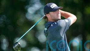 Rookie Austin Eckroat grabs share of lead as Scottie Scheffler falters