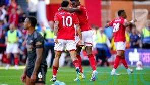 Nottingham Forest upset Arsenal to clinch safety and hand Manchester City title