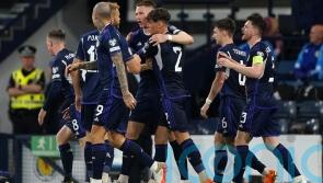 Scotland beat Georgia &ndash; and the weather &ndash; to move eight points clear in Group A
