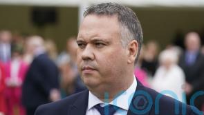 Three men charged over shooting of Detective John Caldwell