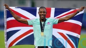 Zharnel Hughes reveals hospital trip after completing sprint double
