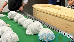 Reburial ceremony held as 400-year-old human skulls returned to Irish island