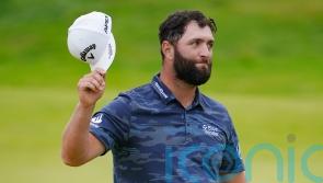 Jon Rahm shoots stunning 63 to surge into contention at The Open