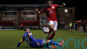 Crewe fight back from two down to earn point against 10-man Mansfield