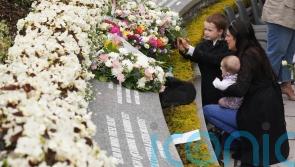 Poignant service at memorial garden marks 25th anniversary of Omagh bombing