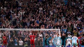 Tottenham claim dramatic last-gasp victory over nine-man Liverpool