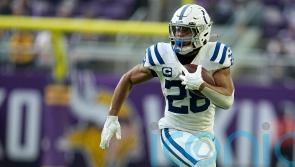 Jonathan Taylor ends speculation over his future by committing to the Colts