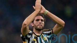 Juventus turn heat up on Serie A pacesetters with victory over 10-man AC Milan