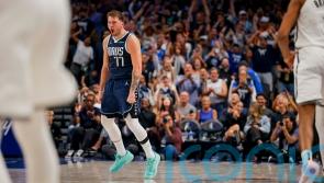 Luka Doncic scores 49 with four straight three-pointers to beat Brooklyn