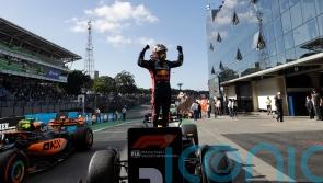 Max Verstappen triumphs at Brazilian GP after narrow escape for Daniel Ricciardo