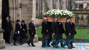 Manchester and wider football world say final goodbyes to Sir Bobby Charlton