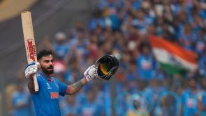 Virat Kohli hits record century as India post huge score in semi-final