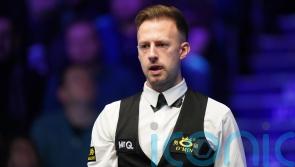 Judd Trump climbs off sick bed to beat Pang Junxu at UK Championship