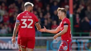 Swindon hold off late Accrington rally after taking foot off gas